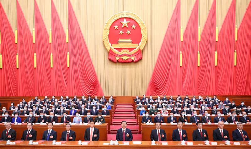 　3月13日，第十四屆全國人民代表大會第一次會議在北京人民大會堂閉幕。習近平等黨和國家領導人在主席臺就座。
